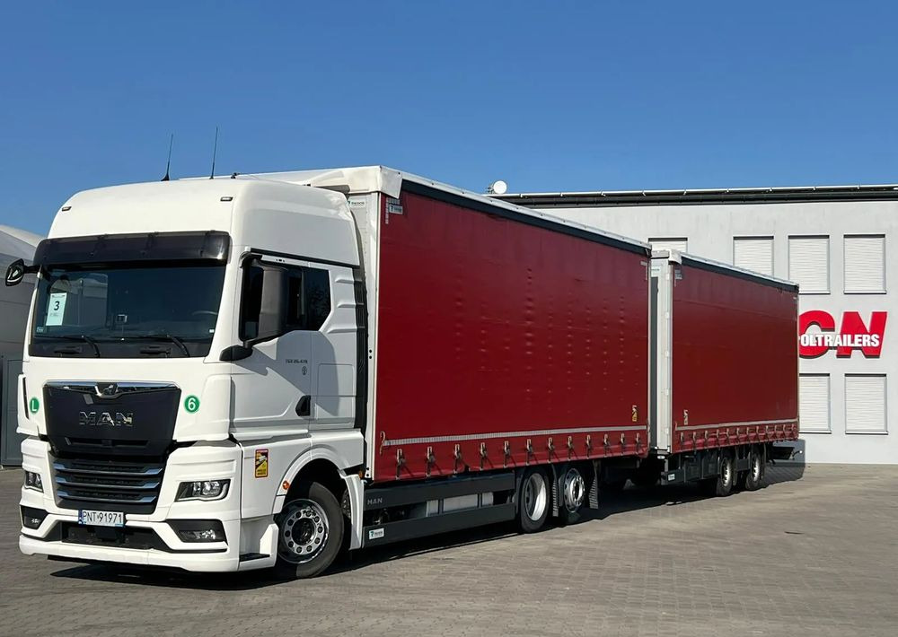 MAN TGX 26.470 z przyczepą Redos - Xe tải thùng mui bạt: hình 1 MAN TGX 26.470 z przyczepą Redos - Xe tải thùng mui bạt: hình 1