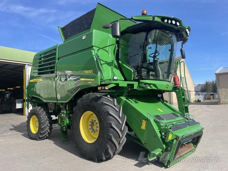 John Deere T670 i - Máy gặt đập: hình 1 John Deere T670 i - Máy gặt đập: hình 1