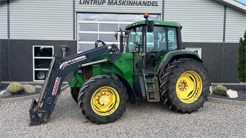 John Deere 6910 Auto Quad II-TLS Med frontlæsser - Máy cày: hình 1 John Deere 6910 Auto Quad II-TLS Med frontlæsser - Máy cày: hình 1
