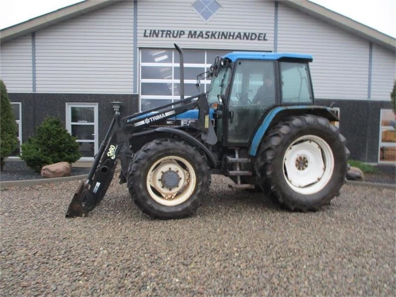 New Holland 7740 SLE Turbo Med frontlæsser og frontlift. - Máy cày: hình 1 New Holland 7740 SLE Turbo Med frontlæsser og frontlift. - Máy cày: hình 1