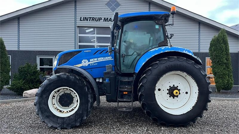 New Holland T7.230 Autocommand med frontlift og nye bagdæk er - Máy cày: hình 1 New Holland T7.230 Autocommand med frontlift og nye bagdæk er - Máy cày: hình 1