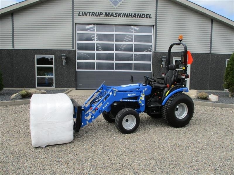 Solis 26 HST med fuldhydraulisk frontlæsser på - Máy cày mini: hình 1 Solis 26 HST med fuldhydraulisk frontlæsser på - Máy cày mini: hình 1