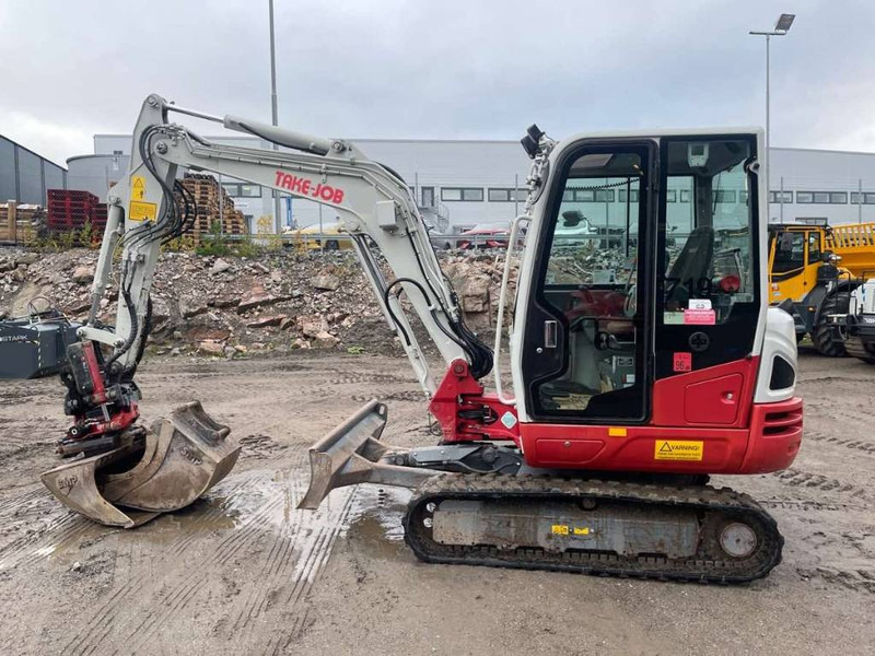 Takeuchi TB 240 - Máy xúc mini: hình 1 Takeuchi TB 240 - Máy xúc mini: hình 1