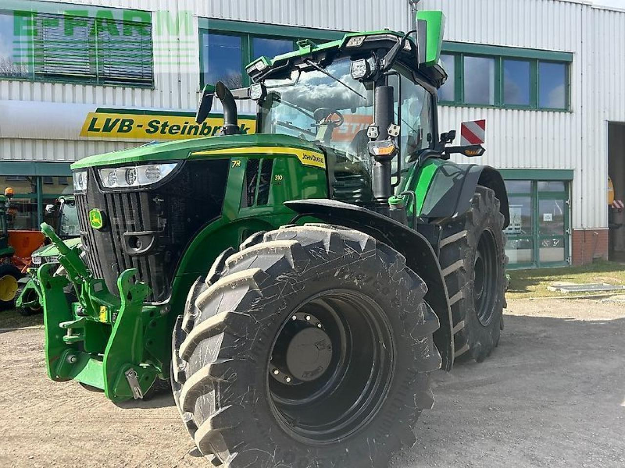 John Deere 7r310 - Máy cày: hình 1 John Deere 7r310 - Máy cày: hình 1