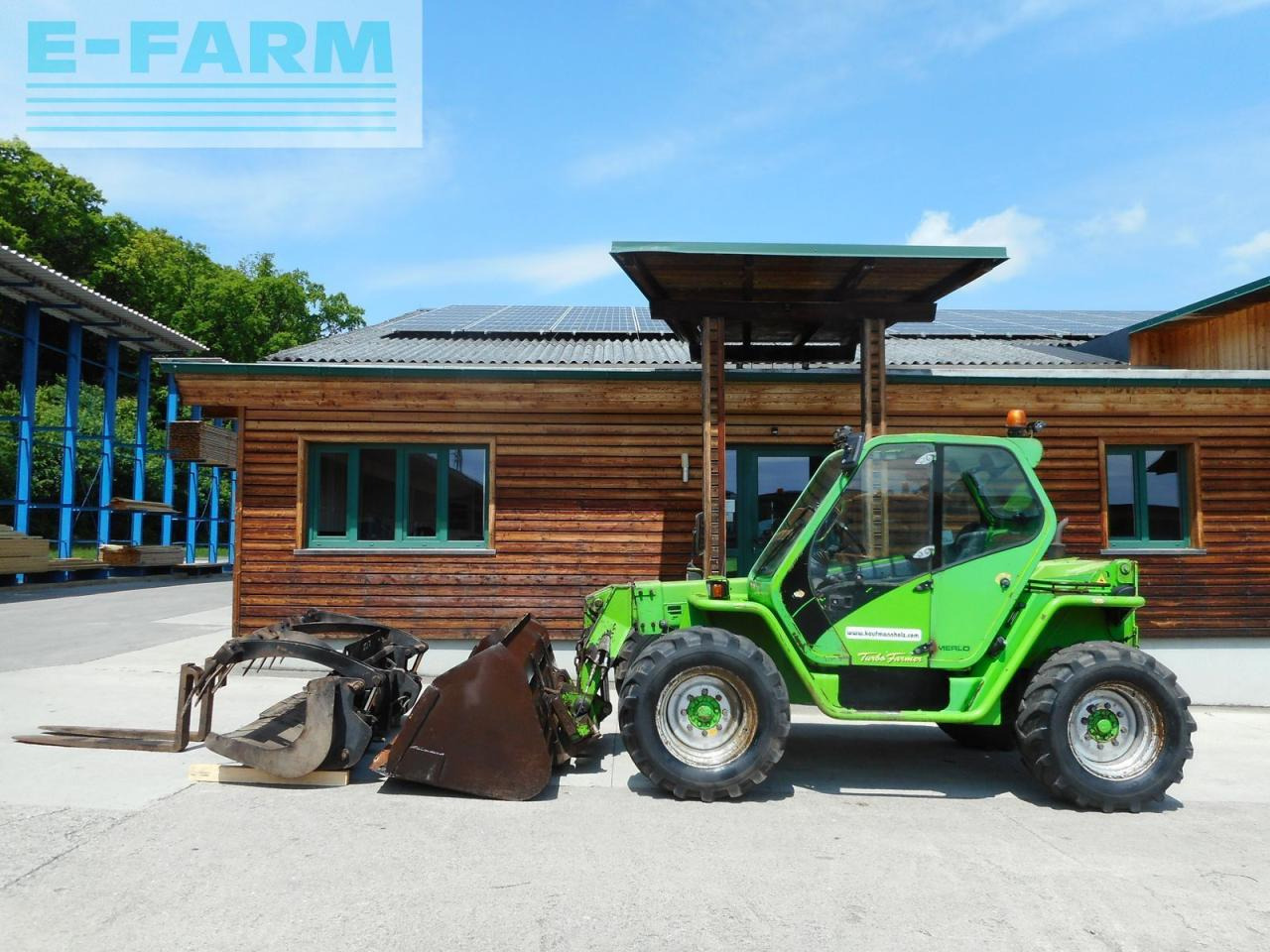 Merlo p33.7kt mit schaufel + greiferschaufel + gabel - Xe nhấc hình viễn vọng kính: hình 1 Merlo p33.7kt mit schaufel + greiferschaufel + gabel - Xe nhấc hình viễn vọng kính: hình 1