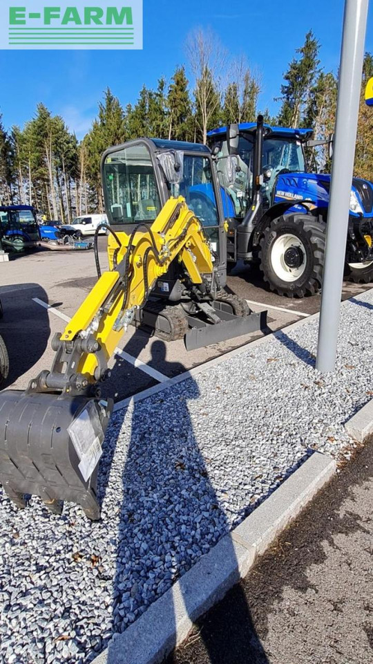Máy xúc mini New Holland e19c: hình 18