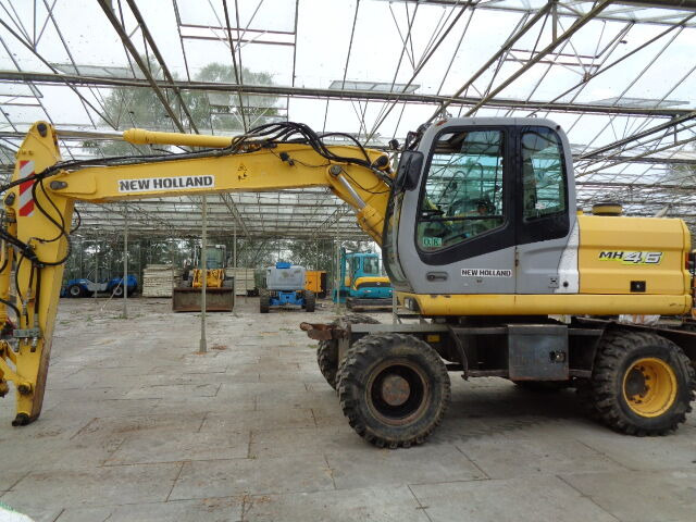 New Holland MH 4.6 - Máy xúc bánh lốp: hình 3 New Holland MH 4.6 - Máy xúc bánh lốp: hình 3