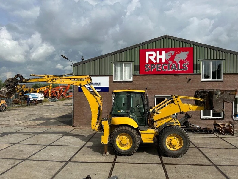 Komatsu WB97S-5E0 - Máy xúc trước múc sau: hình 1 Komatsu WB97S-5E0 - Máy xúc trước múc sau: hình 1