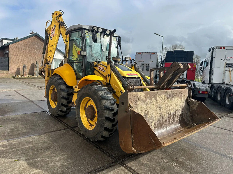 New Holland LB115B, CE, 240 MM MULTI PURPOSE LOADER BUCKET, 800 MM BACHOE DIGGING BUCKET, FLIP OVER FORKS, AIR CONDITIONER - Máy xúc trước múc sau: hình 5 New Holland LB115B, CE, 240 MM MULTI PURPOSE LOADER BUCKET, 800 MM BACHOE DIGGING BUCKET, FLIP OVER FORKS, AIR CONDITIONER - Máy xúc trước múc sau: hình 5