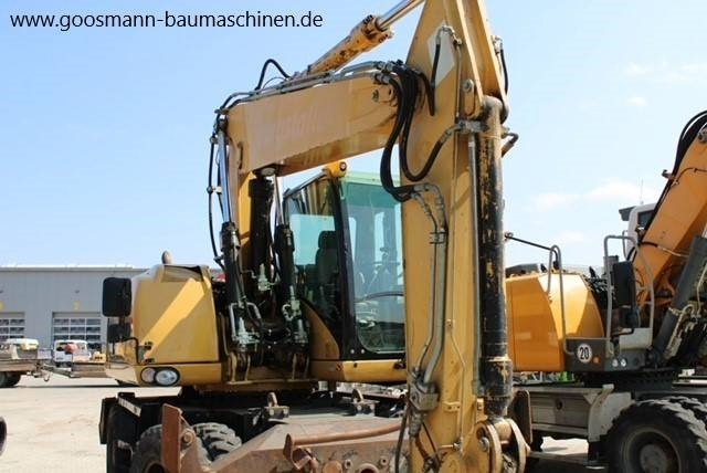 CAT M 315 D - Máy xúc bánh lốp: hình 5 CAT M 315 D - Máy xúc bánh lốp: hình 5