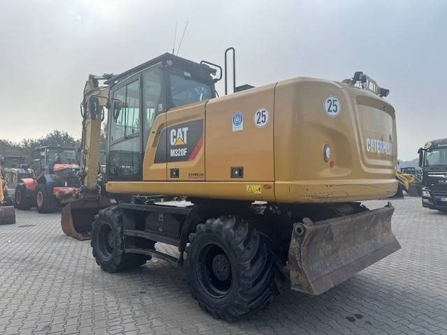 CAT M 320 F - Máy xúc bánh lốp: hình 2 CAT M 320 F - Máy xúc bánh lốp: hình 2