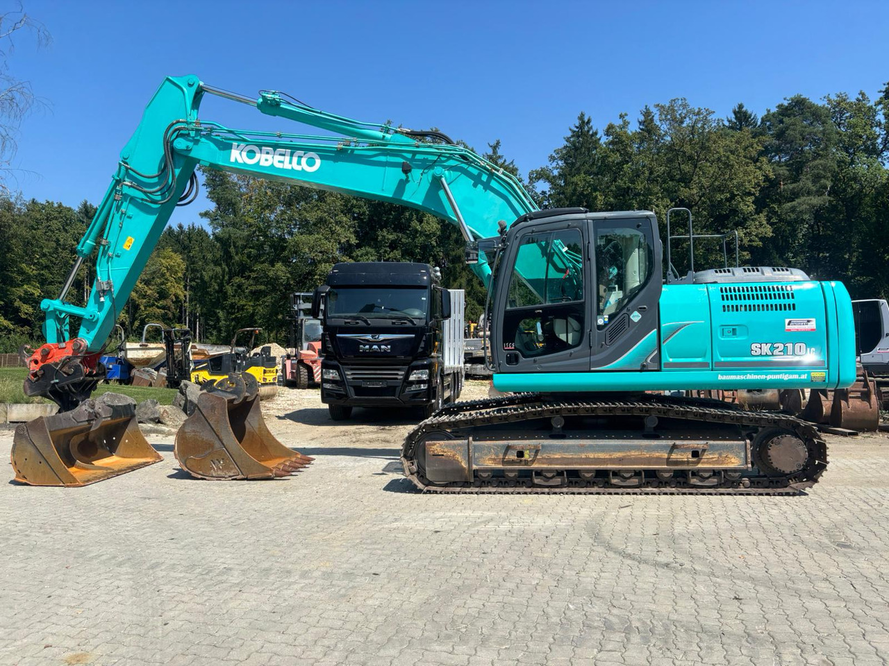 KOBELCO SK 210 NLC-9 - Máy xúc bánh xích: hình 1 KOBELCO SK 210 NLC-9 - Máy xúc bánh xích: hình 1