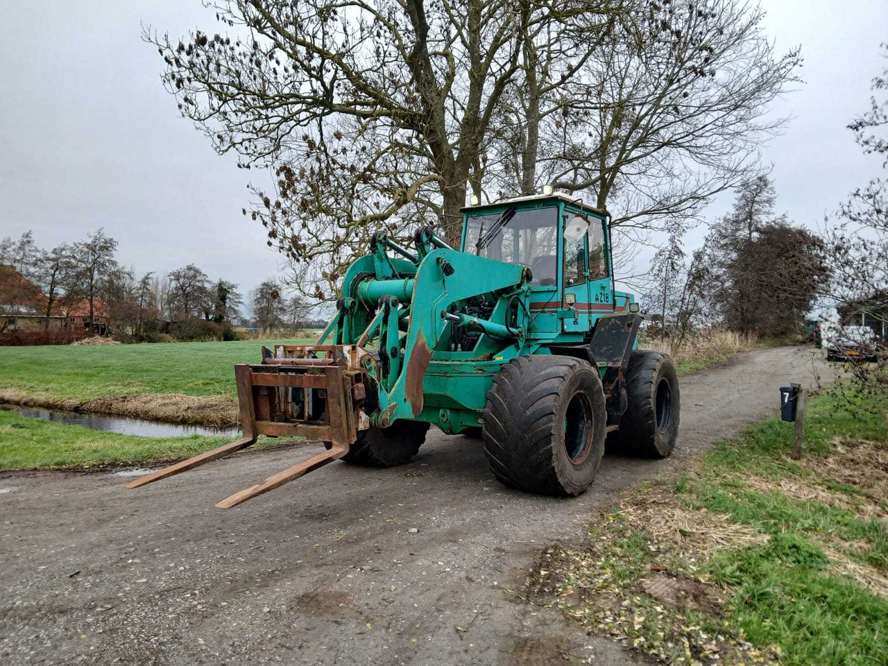 1996 AHLMANN AZ18 SHOVEL - Máy xúc lật bánh lốp: hình 1 1996 AHLMANN AZ18 SHOVEL - Máy xúc lật bánh lốp: hình 1