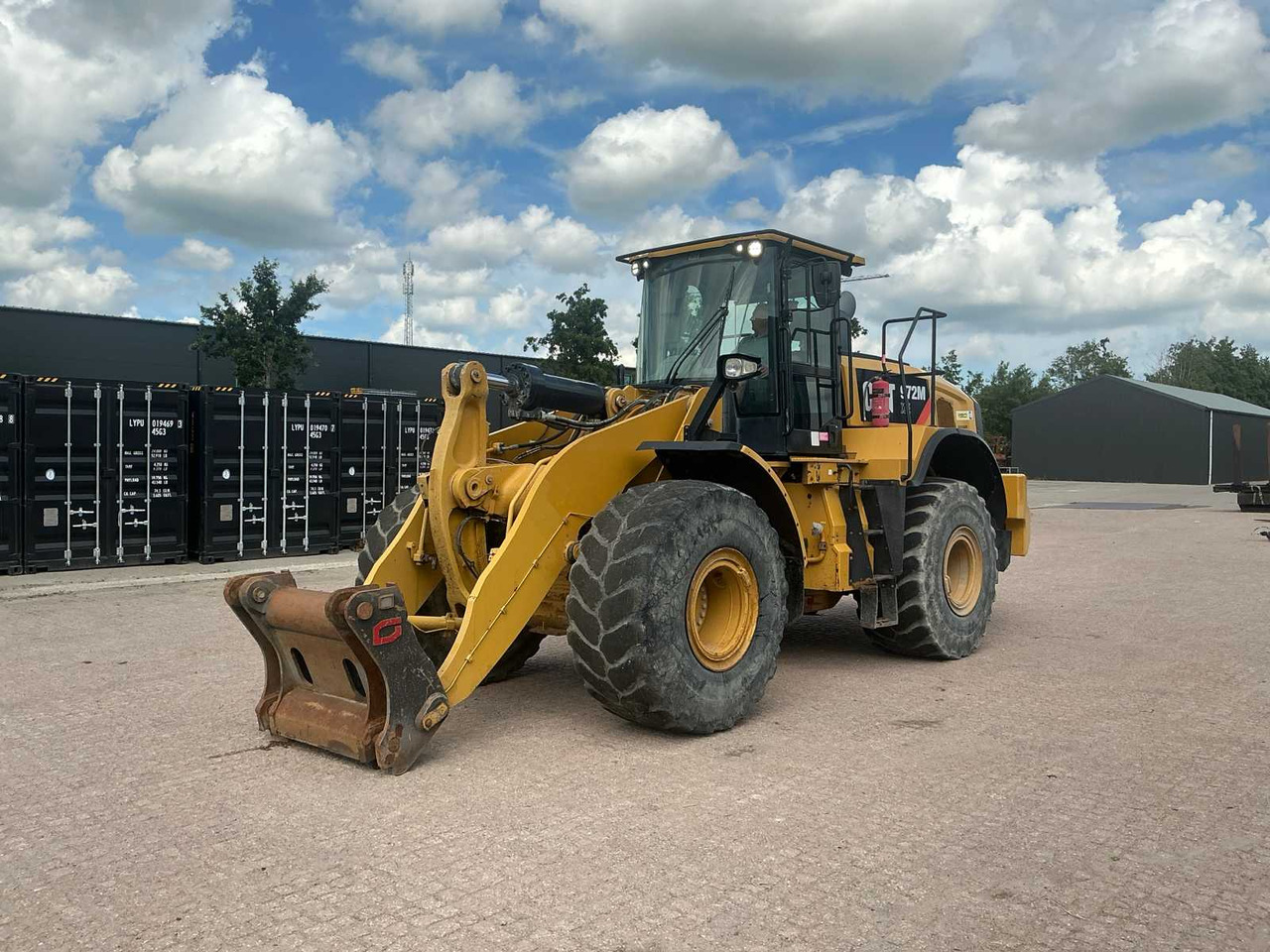Caterpillar 972M XE - Máy xúc lật bánh lốp: hình 1 Caterpillar 972M XE - Máy xúc lật bánh lốp: hình 1