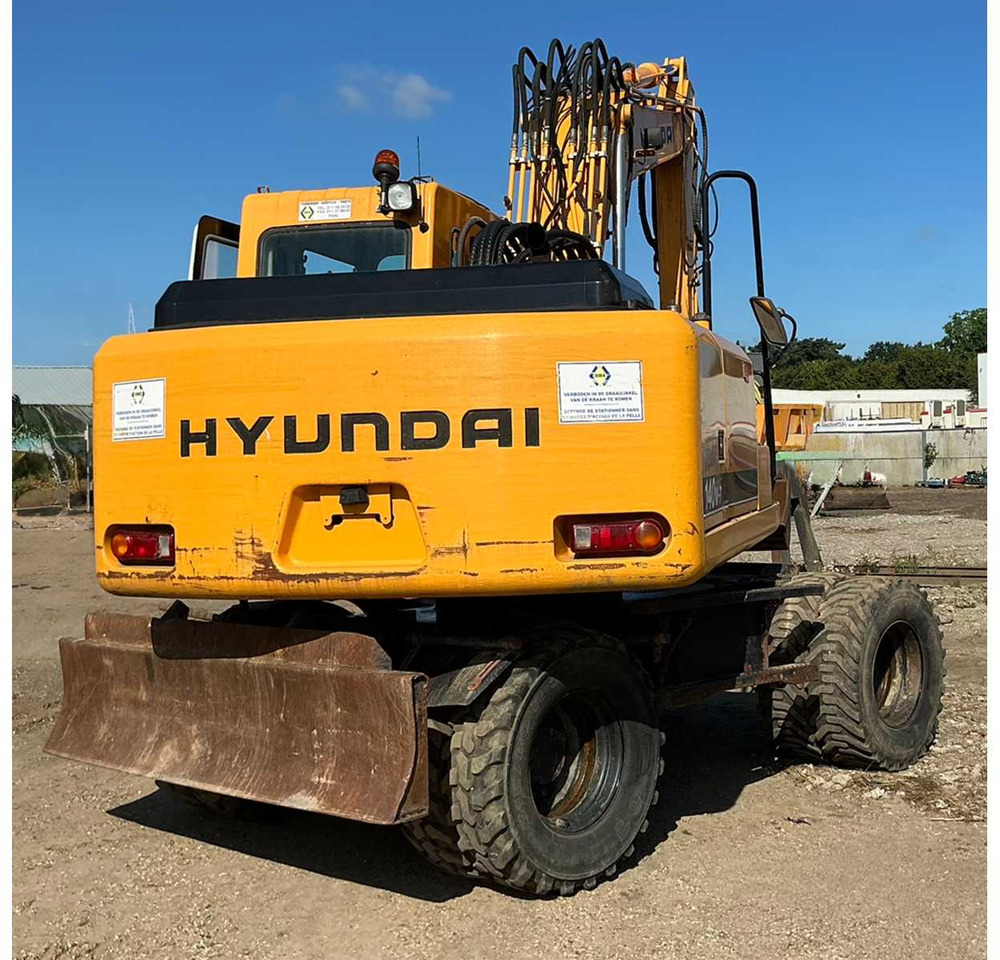 Hyundai Robex140W-7 - Máy xúc bánh lốp: hình 4 Hyundai Robex140W-7 - Máy xúc bánh lốp: hình 4