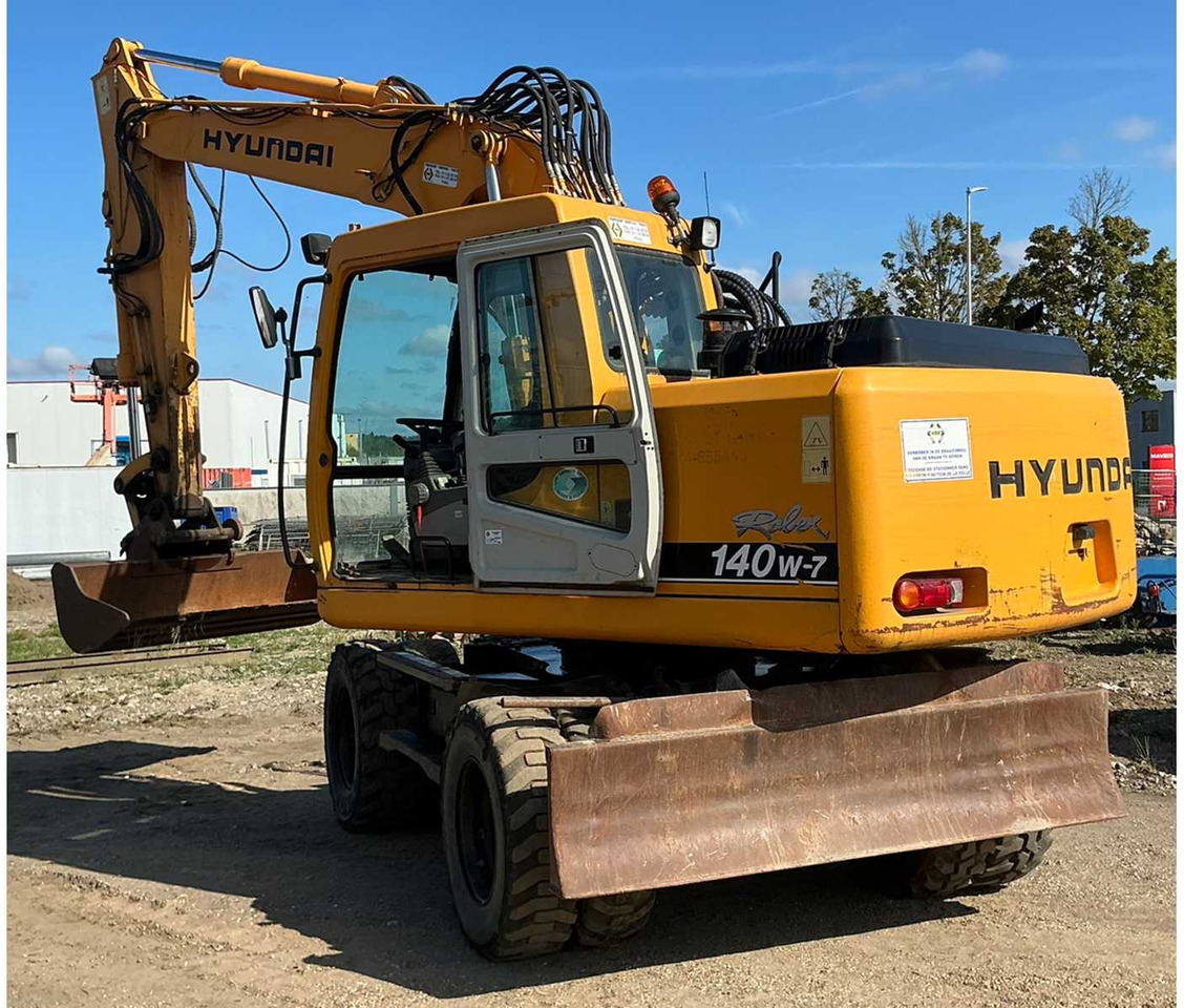 Hyundai Robex140W-7 - Máy xúc bánh lốp: hình 3 Hyundai Robex140W-7 - Máy xúc bánh lốp: hình 3