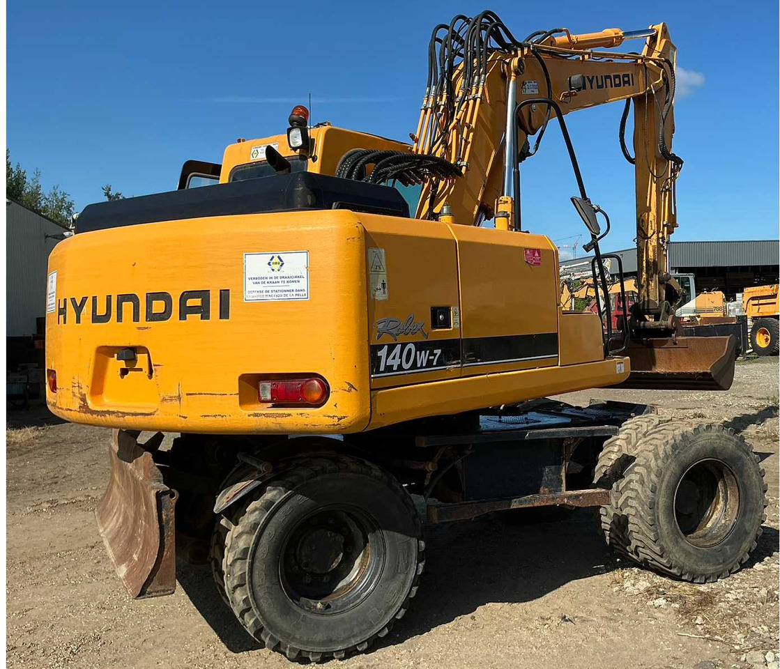 Hyundai Robex140W-7 - Máy xúc bánh lốp: hình 5 Hyundai Robex140W-7 - Máy xúc bánh lốp: hình 5