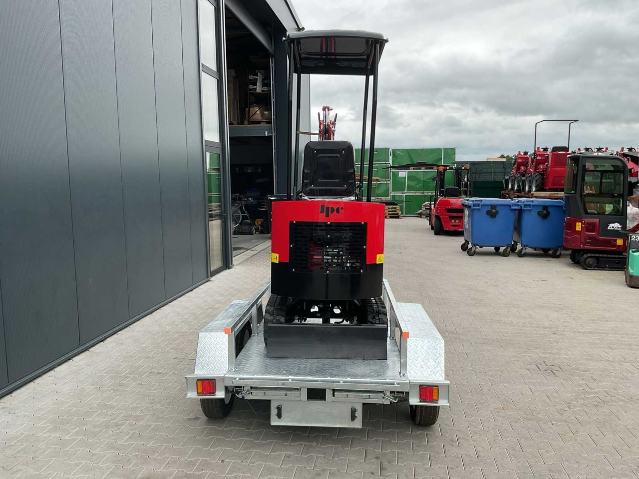 JPC HT12 met aanhangwagen - Máy xúc trước múc sau: hình 4 JPC HT12 met aanhangwagen - Máy xúc trước múc sau: hình 4