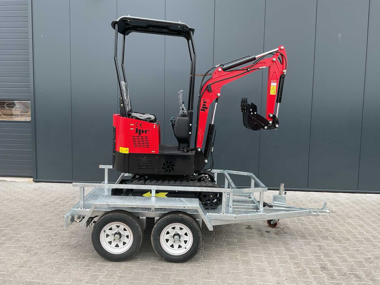 JPC HT12 met aanhangwagen - Máy xúc trước múc sau: hình 2 JPC HT12 met aanhangwagen - Máy xúc trước múc sau: hình 2