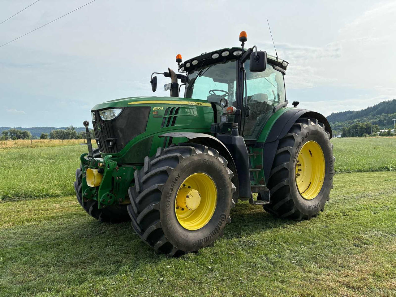John Deere 6210R - Máy cày: hình 1 John Deere 6210R - Máy cày: hình 1