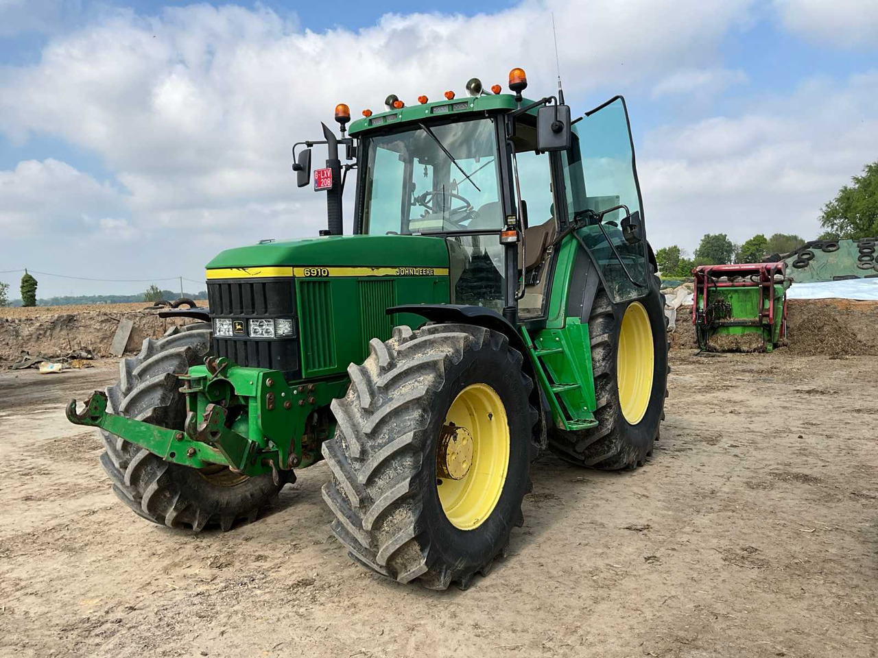 John Deere 6910 - Máy cày: hình 1 John Deere 6910 - Máy cày: hình 1