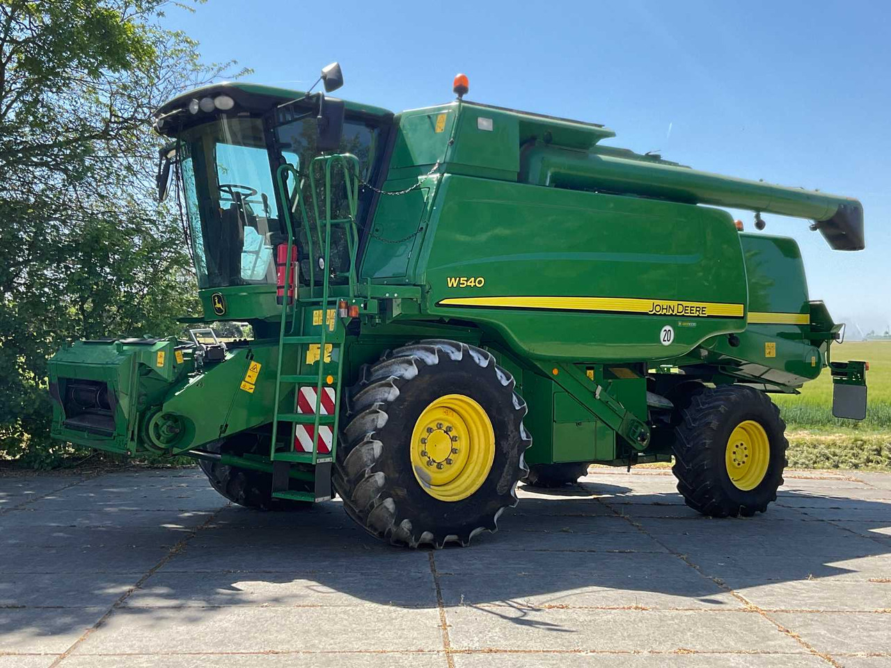 John Deere W540 - Máy gặt đập: hình 1 John Deere W540 - Máy gặt đập: hình 1