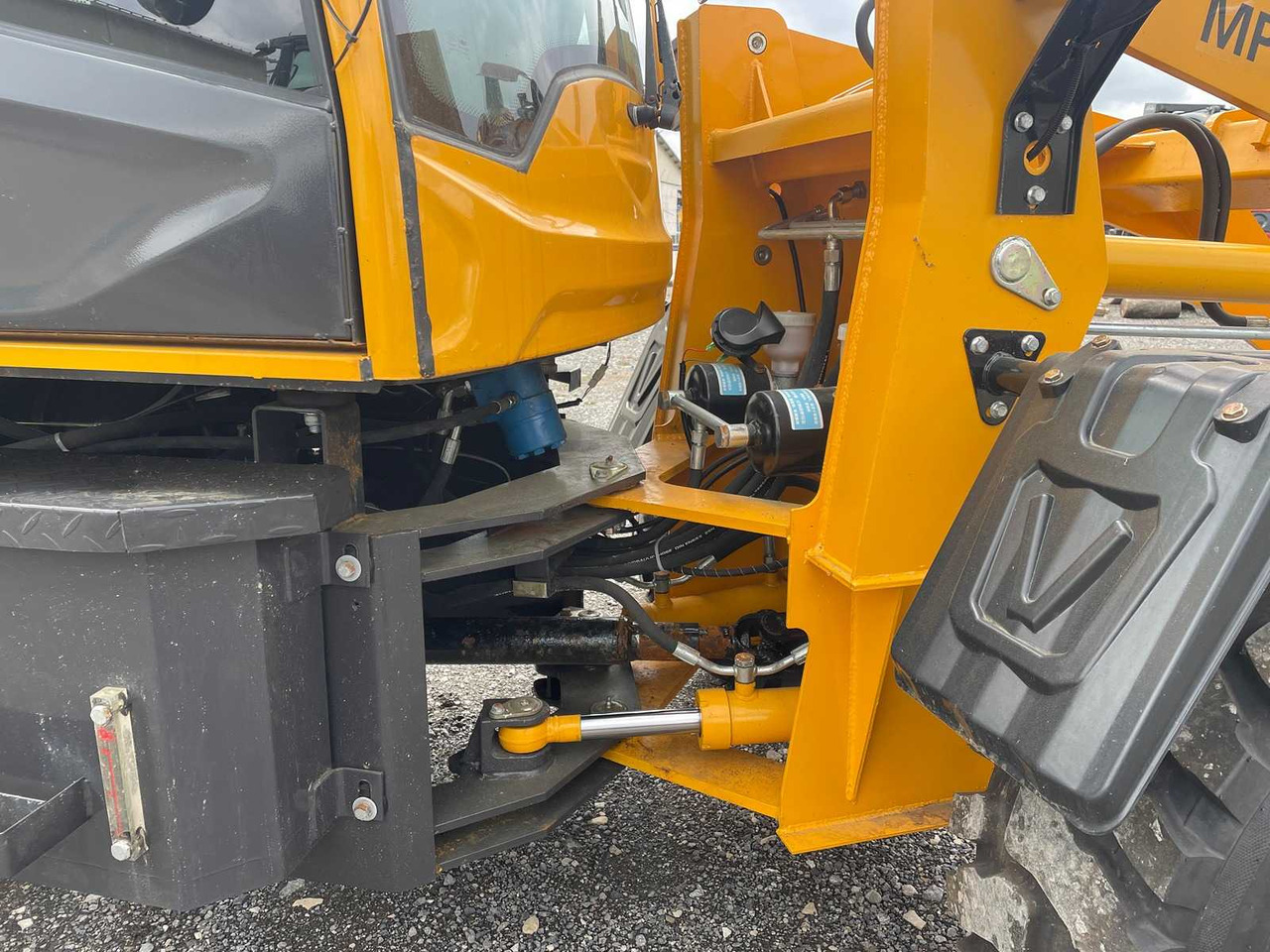 Machpro - Máy xúc lật bánh lốp: hình 5 Machpro - Máy xúc lật bánh lốp: hình 5