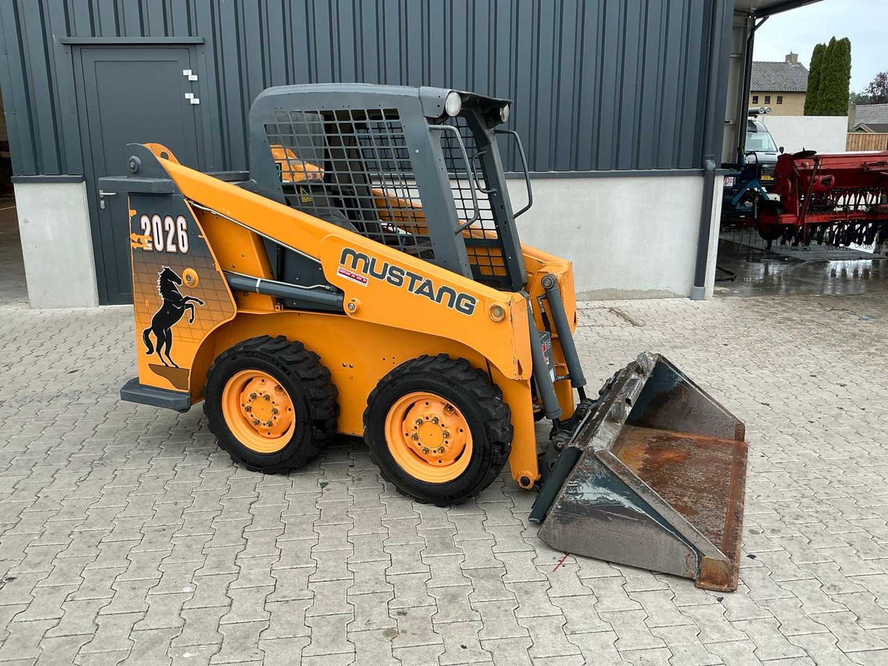 Mustang 2014 MUSTANG 2026 SKID STEER LOADER - Máy xúc lật đa năng: hình 3 Mustang 2014 MUSTANG 2026 SKID STEER LOADER - Máy xúc lật đa năng: hình 3