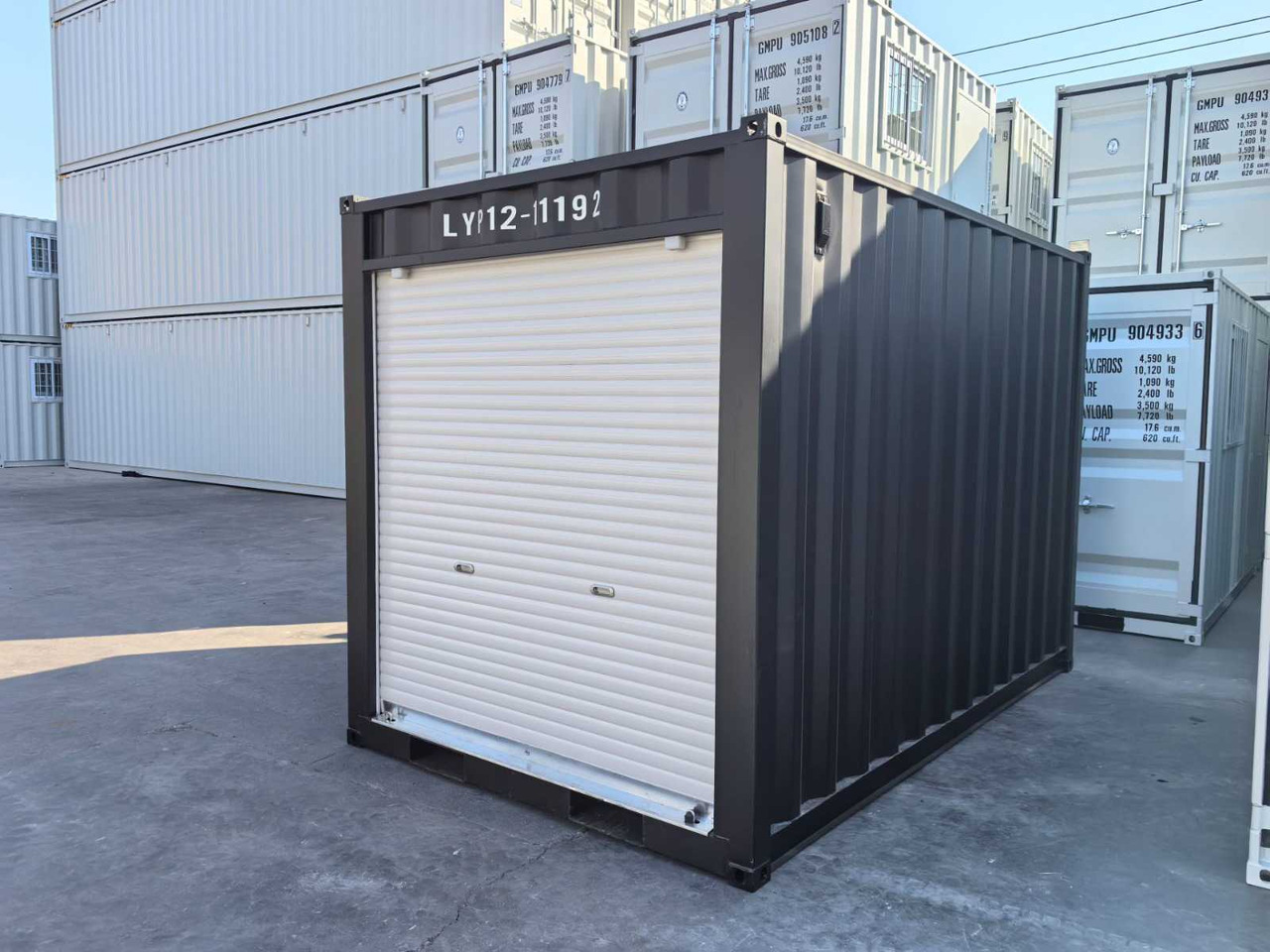 Rhino-cross-containers 12ft met roldeur - Container biển: hình 1 Rhino-cross-containers 12ft met roldeur - Container biển: hình 1
