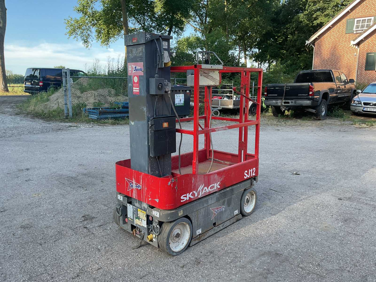 Skyjack SJ12 - Nền bục trên không: hình 1 Skyjack SJ12 - Nền bục trên không: hình 1