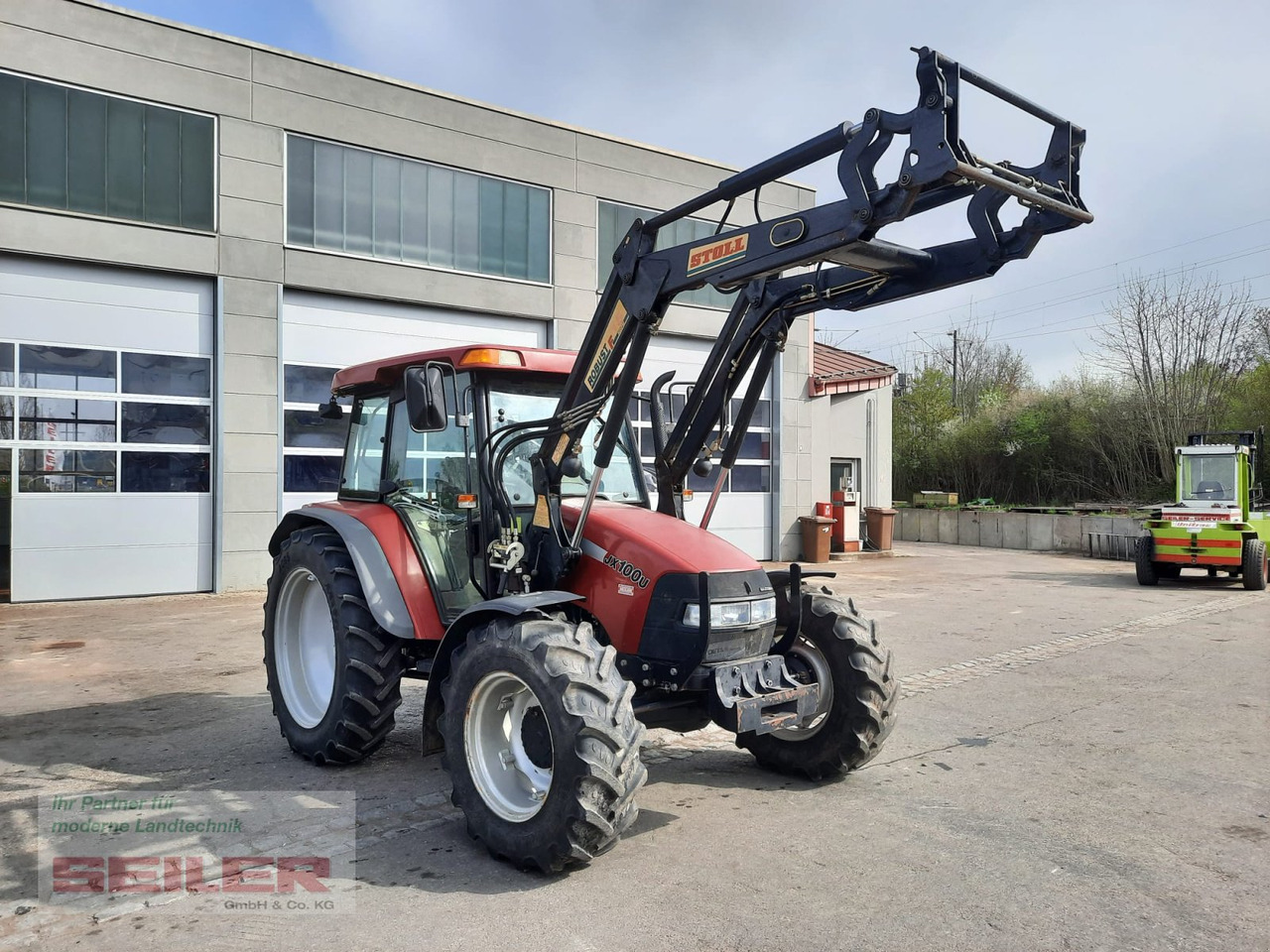 Case IH JX 100 U - Máy cày: hình 1 Case IH JX 100 U - Máy cày: hình 1