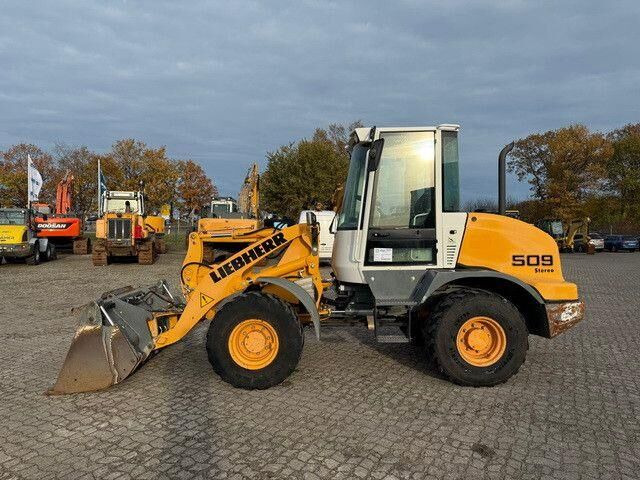 Liebherr L 509, 4+1 Schaufel, 3. Steuerkreis, Gabel - Máy xúc lật bánh lốp: hình 3 Liebherr L 509, 4+1 Schaufel, 3. Steuerkreis, Gabel - Máy xúc lật bánh lốp: hình 3