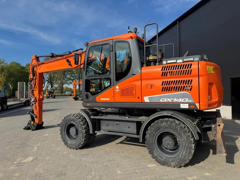 Doosan DX140-5 2018 - Máy xúc bánh lốp: hình 3 Doosan DX140-5 2018 - Máy xúc bánh lốp: hình 3