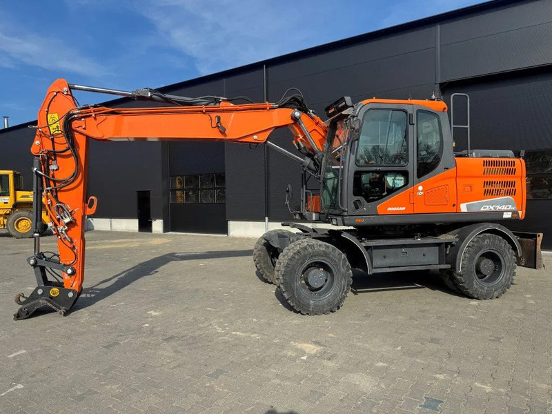 Doosan DX140-5 2018 - Máy xúc bánh lốp: hình 2 Doosan DX140-5 2018 - Máy xúc bánh lốp: hình 2