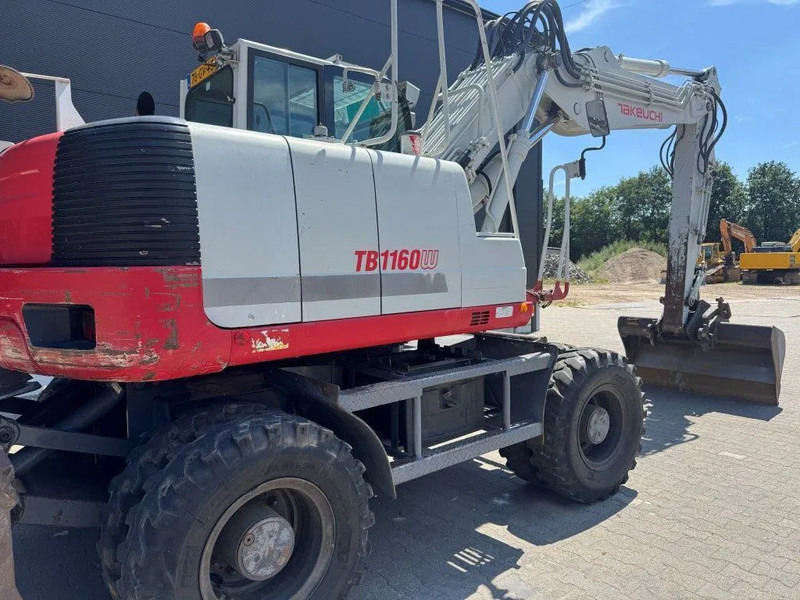 Takeuchi TB1160W - Máy xúc bánh lốp: hình 4 Takeuchi TB1160W - Máy xúc bánh lốp: hình 4