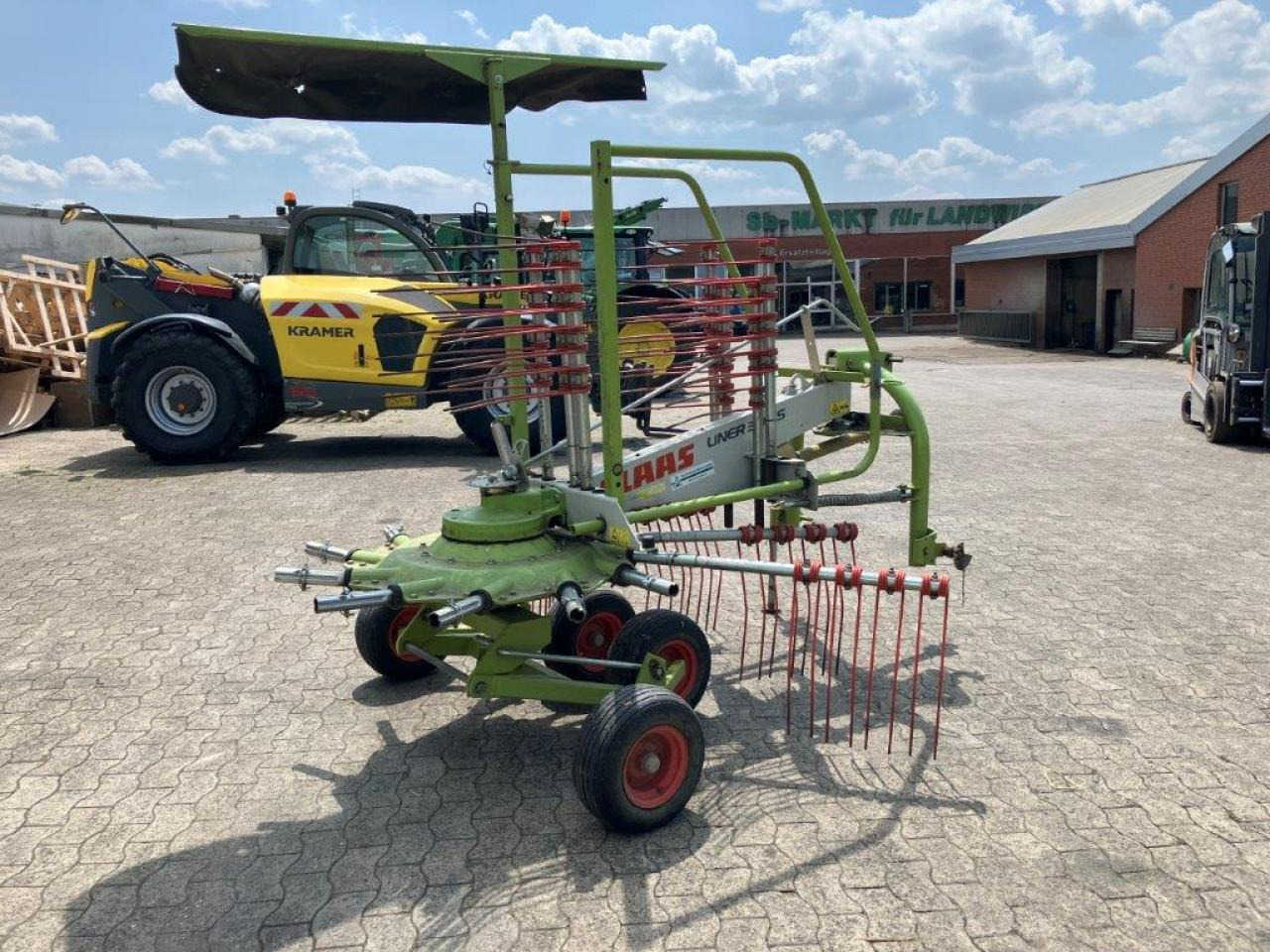 CLAAS Liner 390S - Dàn trải/ Cào: hình 4 CLAAS Liner 390S - Dàn trải/ Cào: hình 4
