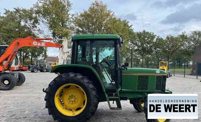 John Deere 6100 - Máy cày: hình 4 John Deere 6100 - Máy cày: hình 4