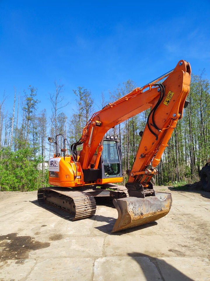 DOOSAN DX140LCR-3 - Máy xúc bánh xích: hình 1 DOOSAN DX140LCR-3 - Máy xúc bánh xích: hình 1