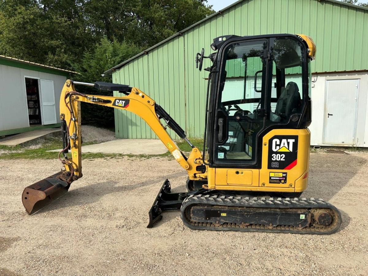 Caterpillar 302 CR - Máy xúc mini: hình 1 Caterpillar 302 CR - Máy xúc mini: hình 1
