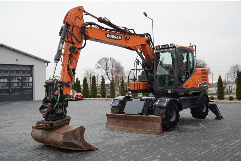 Doosan DX 140W / KOPARKA KOŁOWA / JOYSTICK / POWERTILT OBROTNICA - Máy xúc bánh lốp: hình 1 Doosan DX 140W / KOPARKA KOŁOWA / JOYSTICK / POWERTILT OBROTNICA - Máy xúc bánh lốp: hình 1