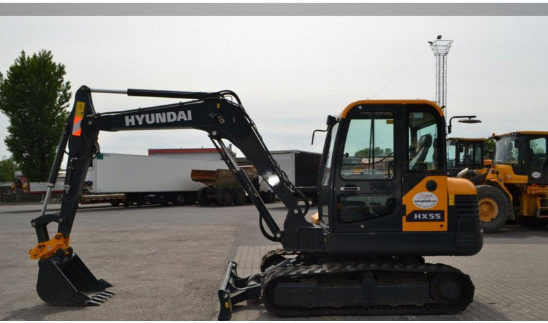 Hyundai HX55 Mini lánctalpas forgókotró - Máy xúc mini: hình 5 Hyundai HX55 Mini lánctalpas forgókotró - Máy xúc mini: hình 5