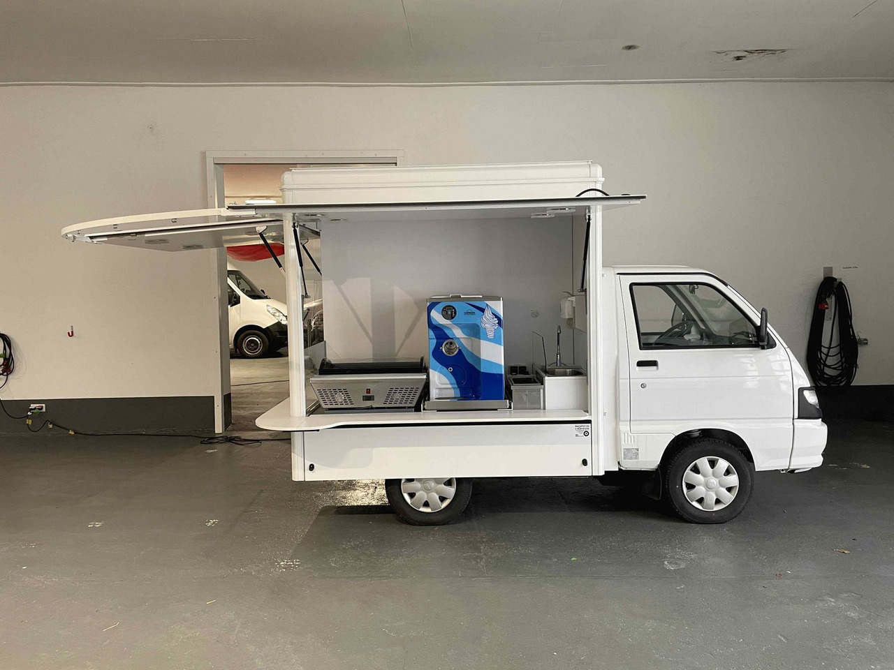 Piaggio Porter - Xe tải bán hàng: hình 3 Piaggio Porter - Xe tải bán hàng: hình 3