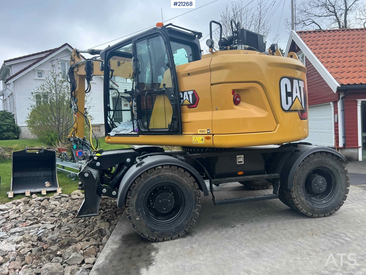 CAT M315 - Máy xúc bánh lốp: hình 4 CAT M315 - Máy xúc bánh lốp: hình 4