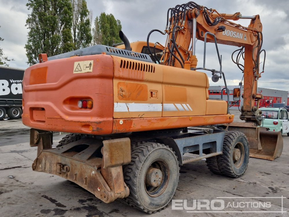 Doosan DX210W - Máy xúc bánh lốp: hình 5 Doosan DX210W - Máy xúc bánh lốp: hình 5