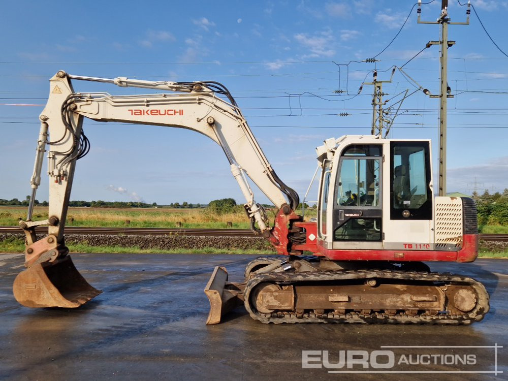 Takeuchi TB1140 - Máy xúc bánh xích: hình 2 Takeuchi TB1140 - Máy xúc bánh xích: hình 2