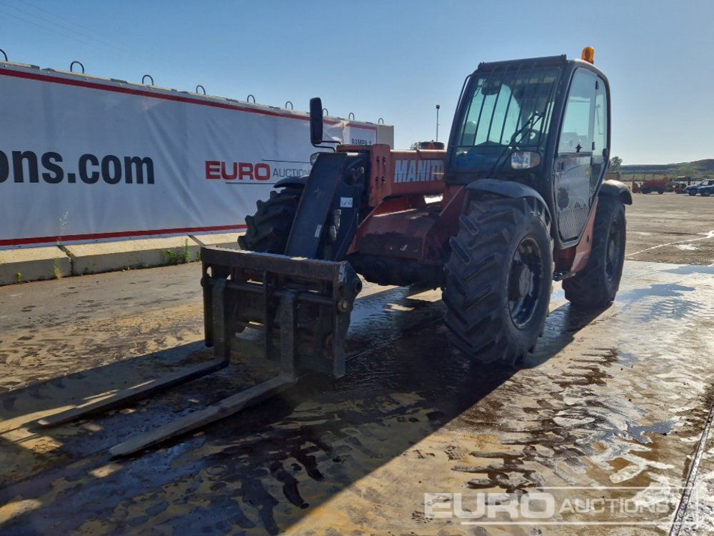 Manitou MT732 - Xe nhấc hình viễn vọng kính: hình 1 Manitou MT732 - Xe nhấc hình viễn vọng kính: hình 1