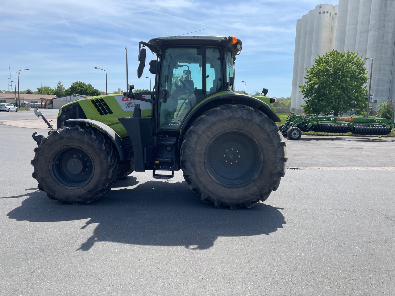 Claas Arion 660 C-matic - Máy cày: hình 1 Claas Arion 660 C-matic - Máy cày: hình 1