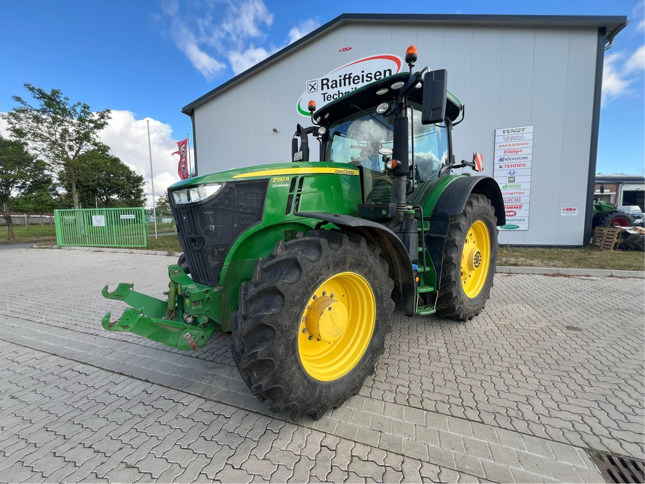 John Deere 7310 R - Máy cày: hình 1 John Deere 7310 R - Máy cày: hình 1