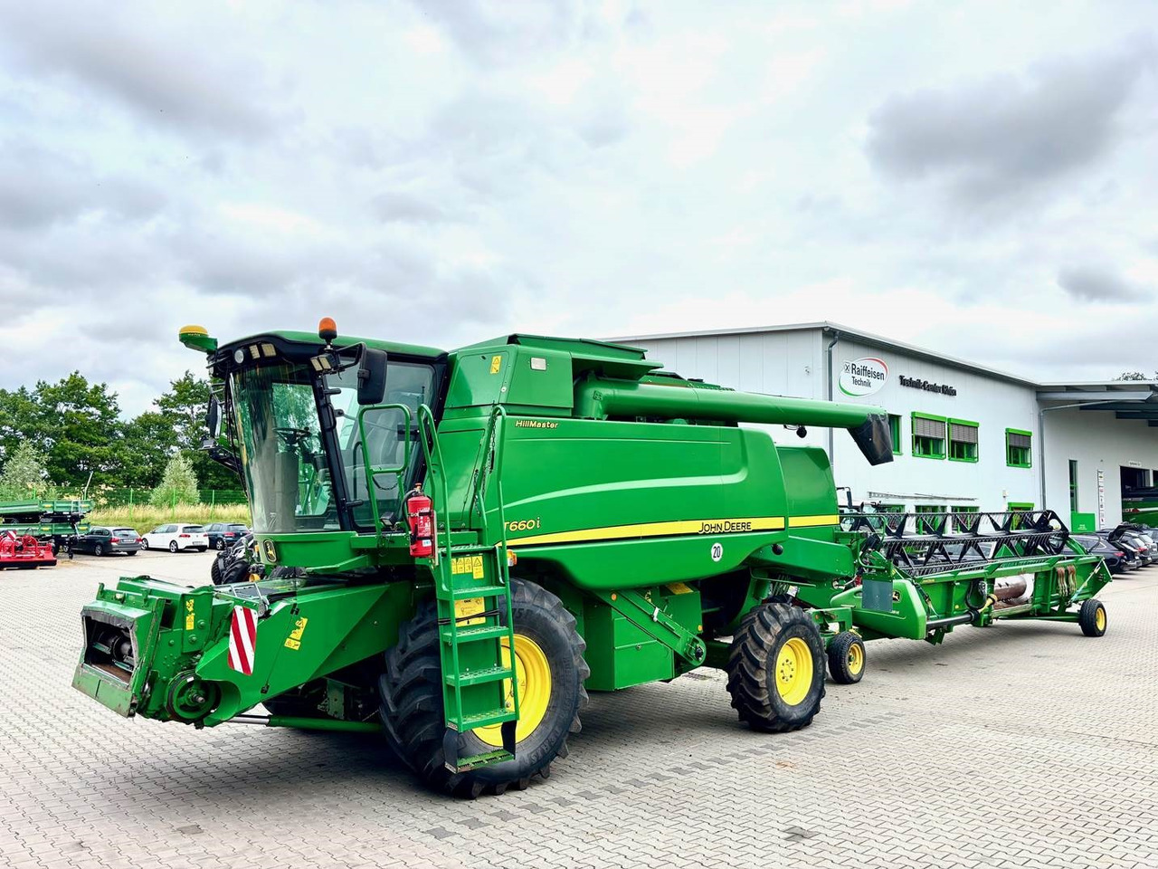 John Deere T660 i Hillmaster - Máy gặt đập: hình 1 John Deere T660 i Hillmaster - Máy gặt đập: hình 1