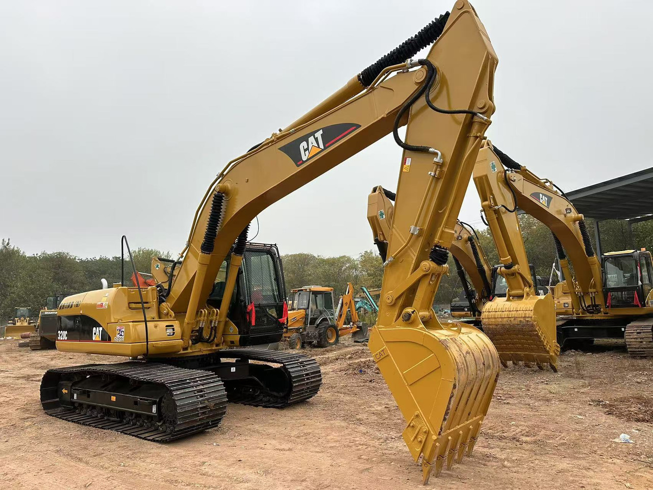 CATERPILLAR 320CL - Máy xúc bánh xích: hình 4 CATERPILLAR 320CL - Máy xúc bánh xích: hình 4